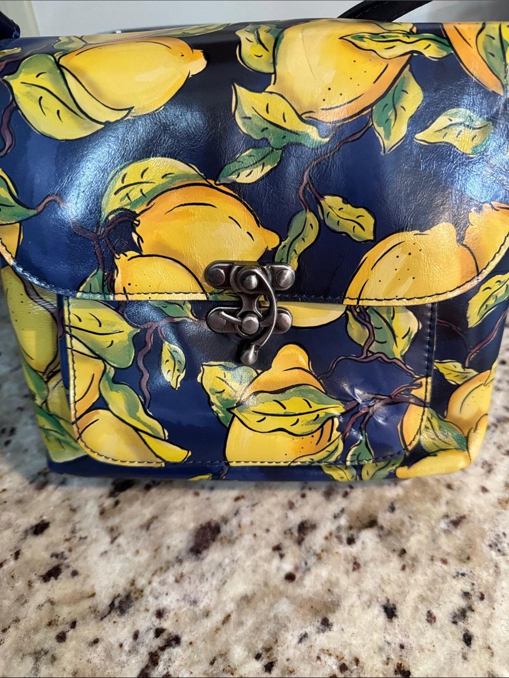 Lemon Print Navy Crossbody Bag with Twist-Lock Closure